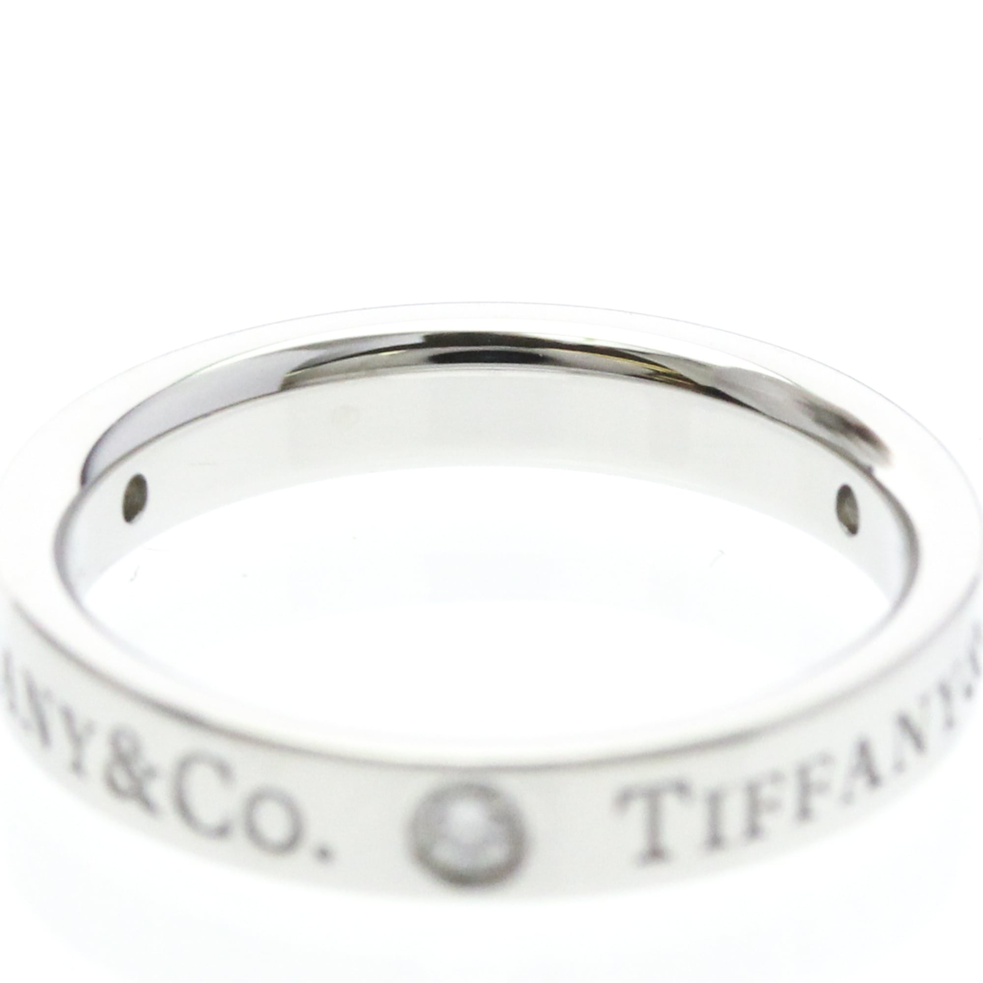 Tiffany Three Diamond · Platinum