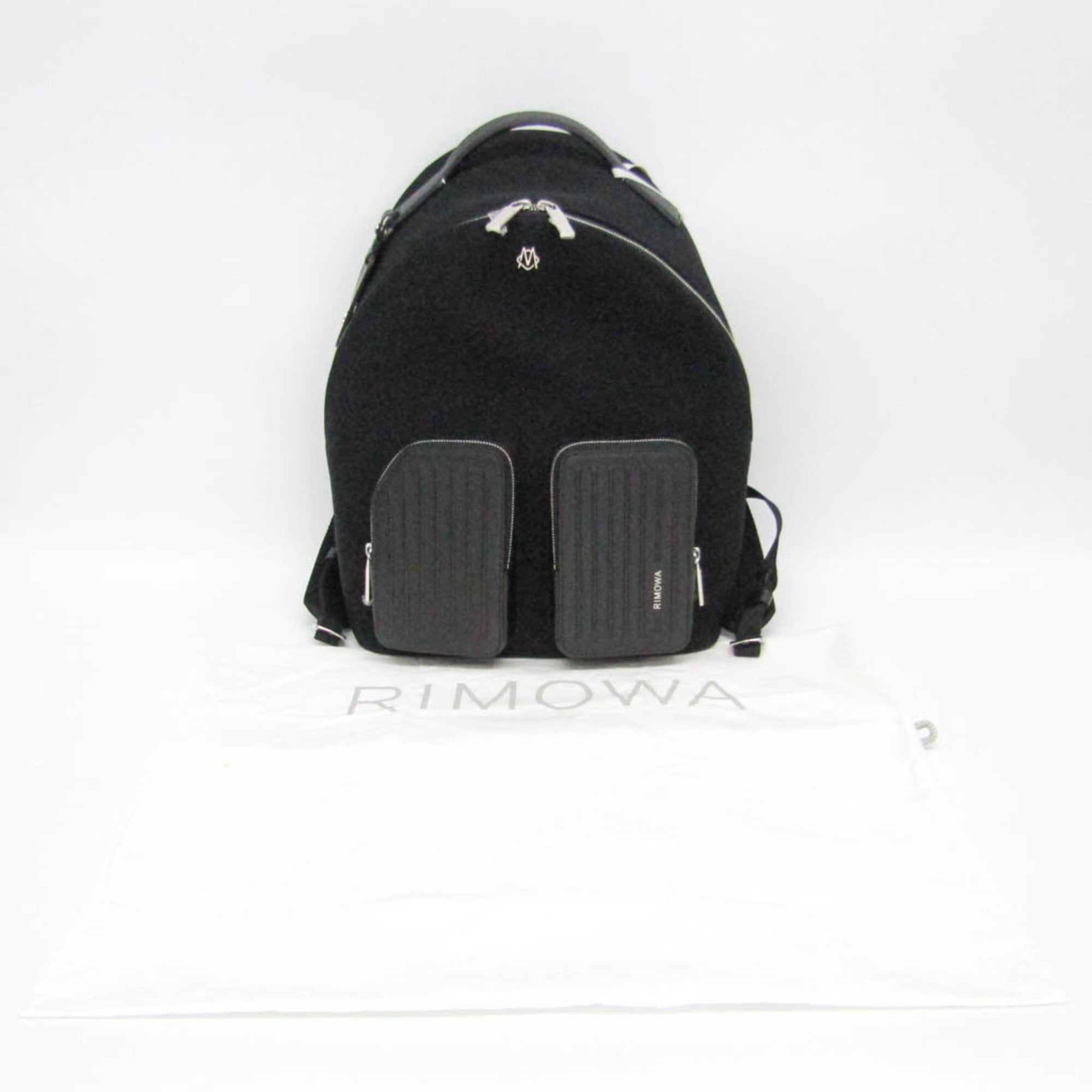 Coach · Leather & Canvas Backpack