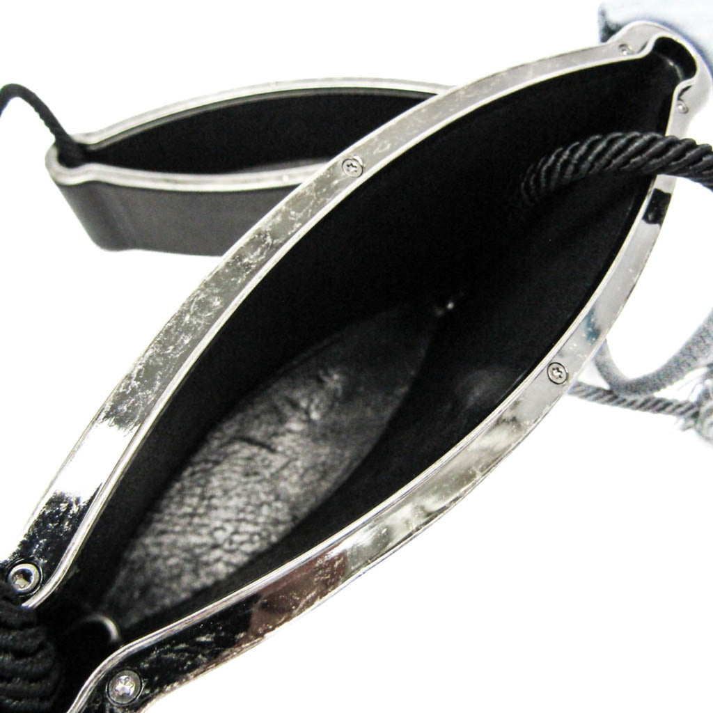 Yves Saint Laurent Opium · Leather