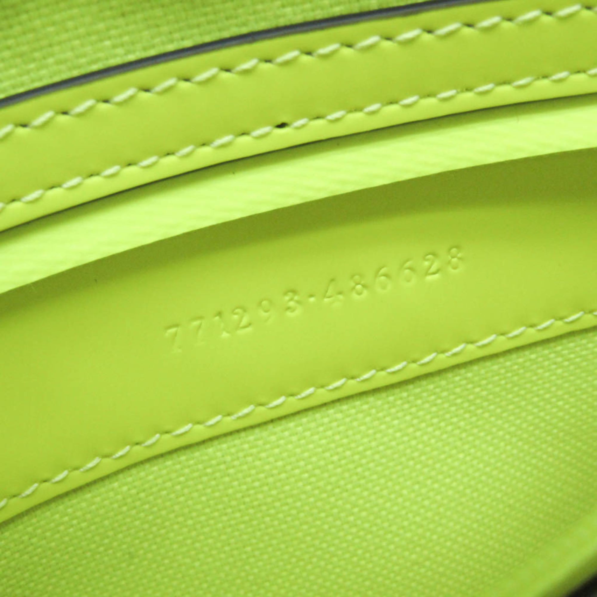 Gucci GG Rubber Effect · Neon Clutch
