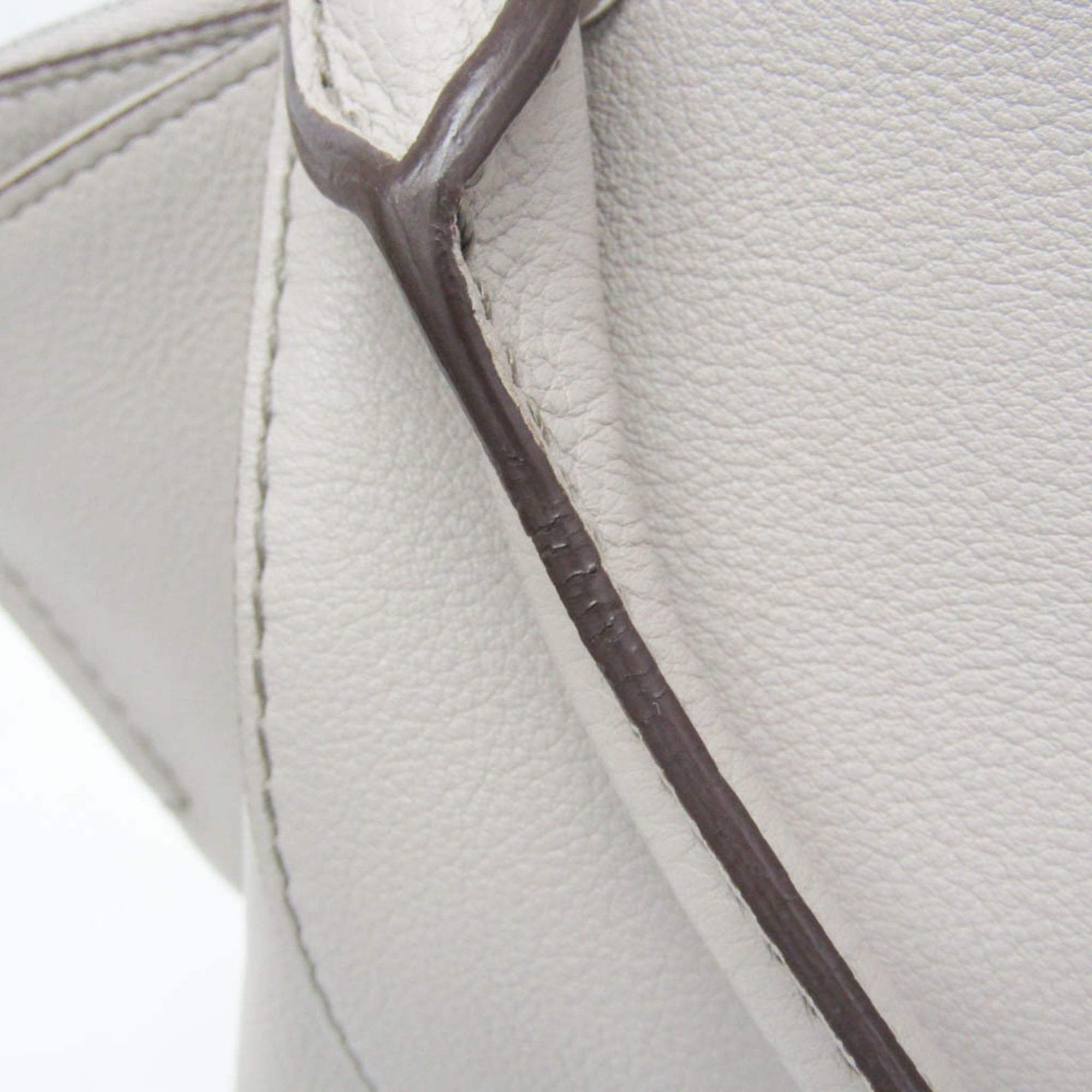 Cartier C de Cartier · Leather