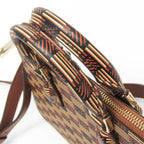 Moreau · Coated Canvas & Leather