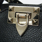 Valentino Garavani Lock Studs · Leather