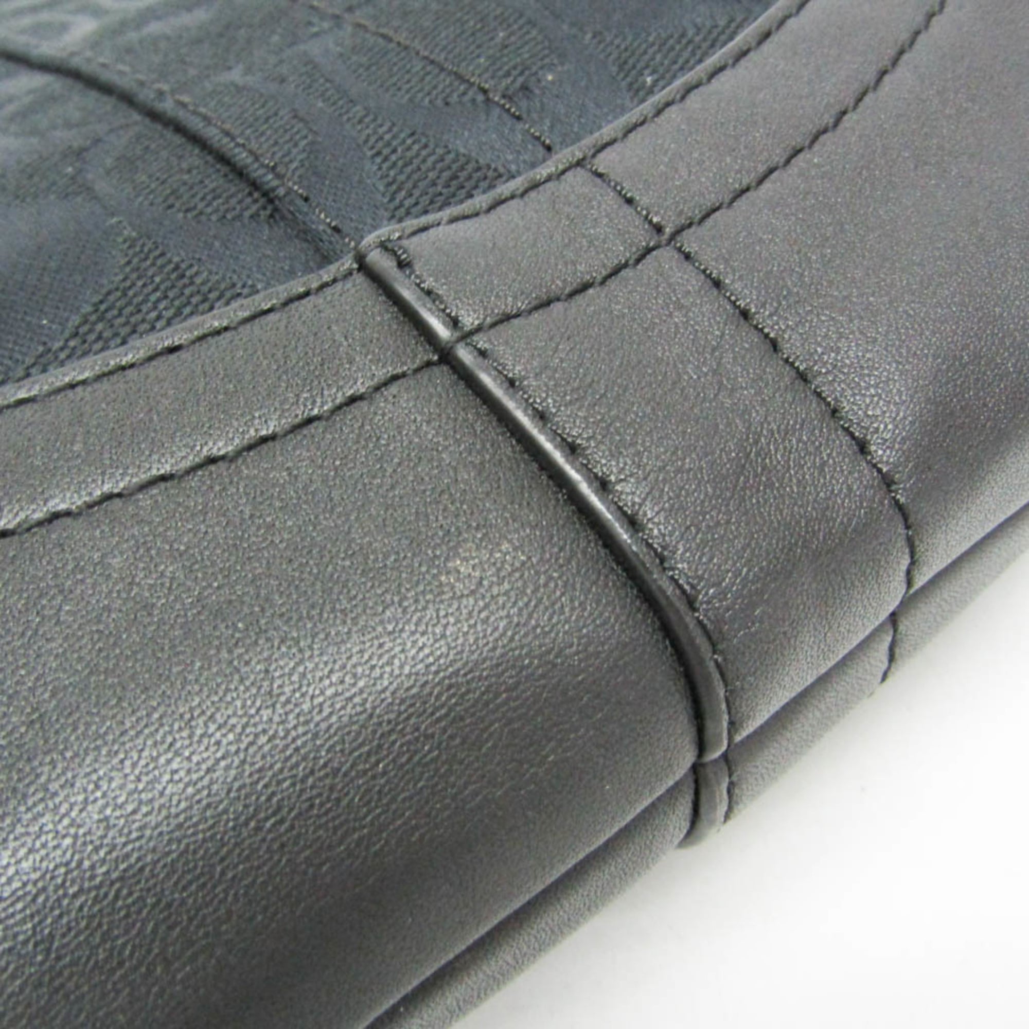 Coach Signature · Canvas & Leather