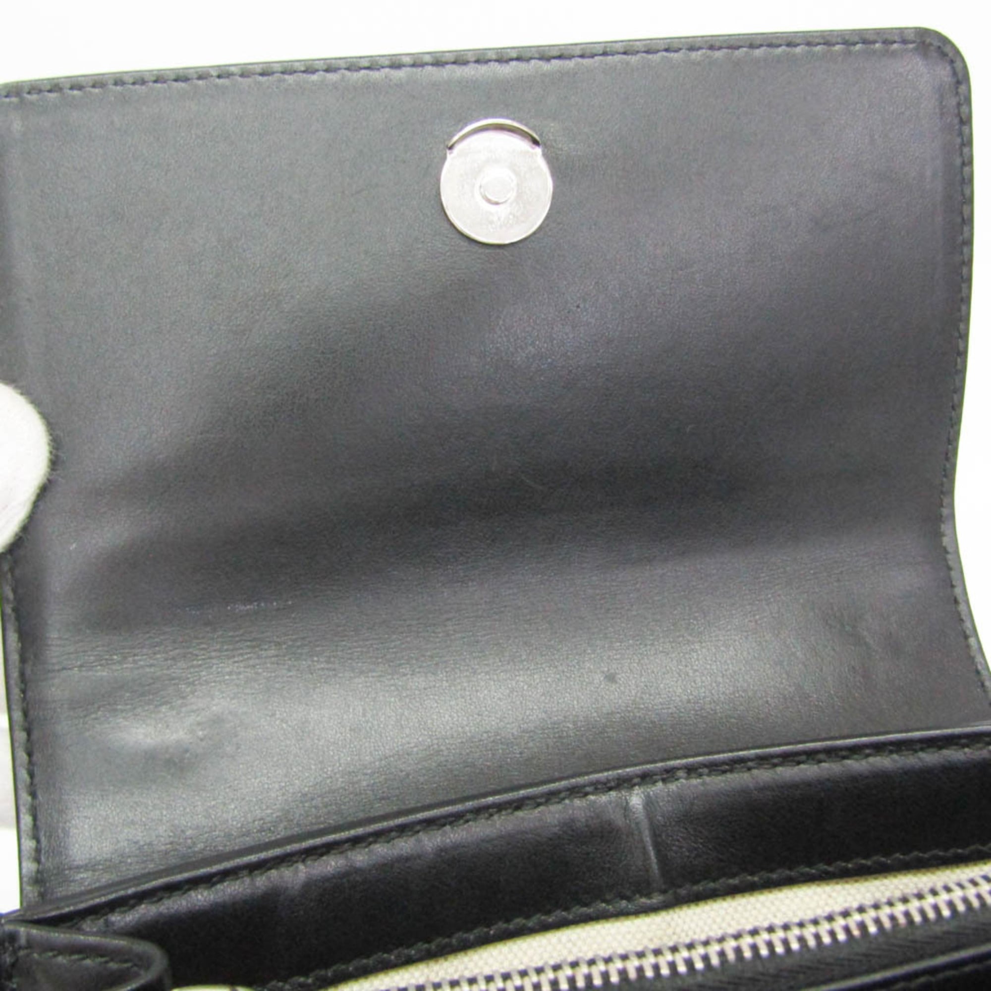 Gucci GG Embossed Crossbody · Leather