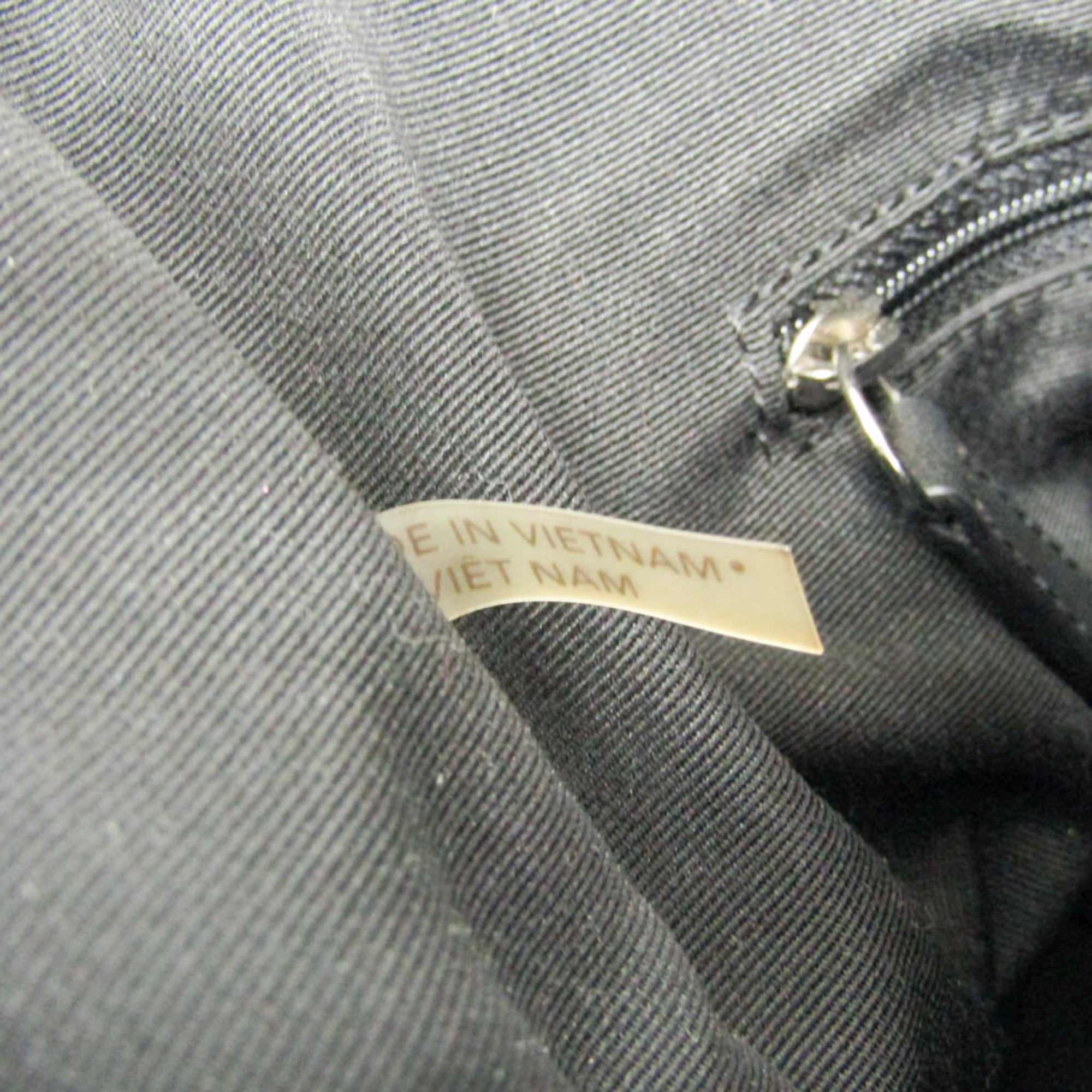 Coach Signature · Canvas & Leather