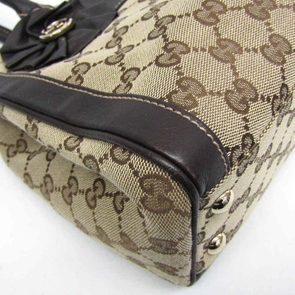 Gucci GG Canvas · Leather Handbag