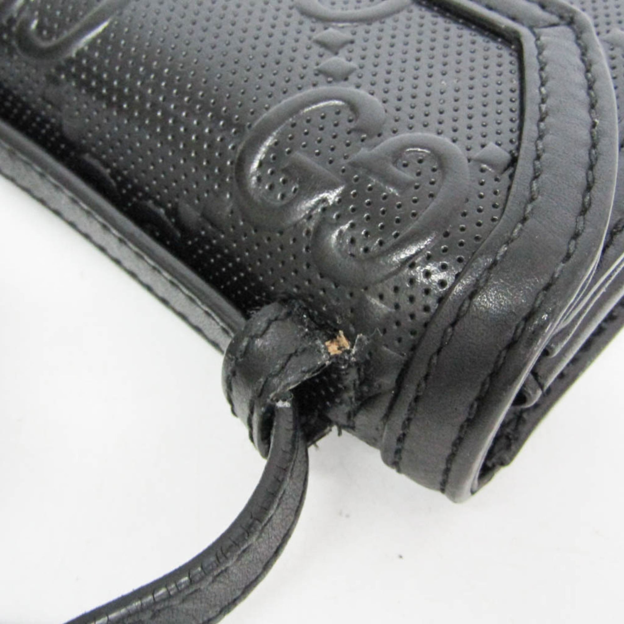 Gucci GG Embossed Crossbody · Leather