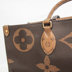 Louis Vuitton On The Go GM · Monogram Reverse