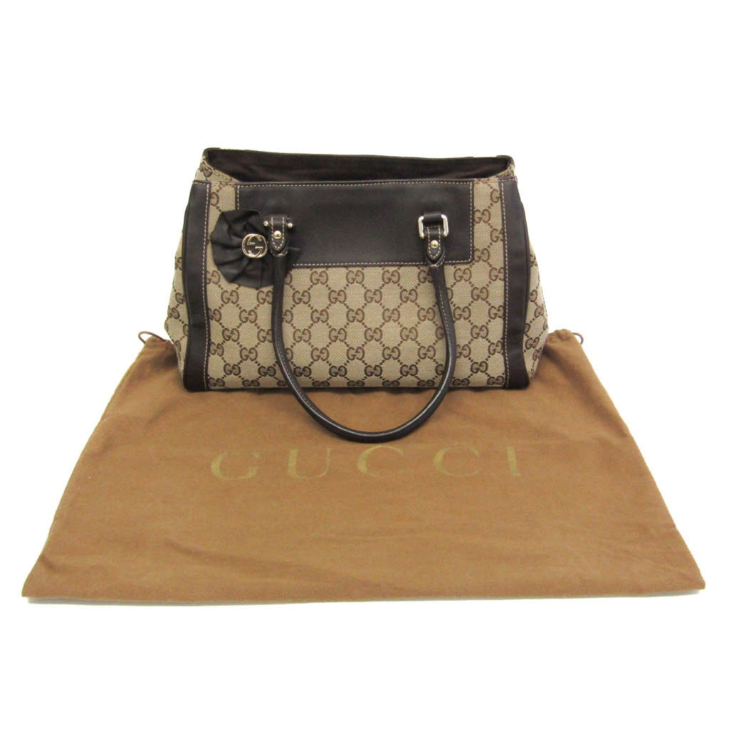 Gucci GG Canvas · Leather Handbag