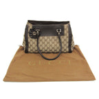 Gucci GG Canvas · Leather Handbag