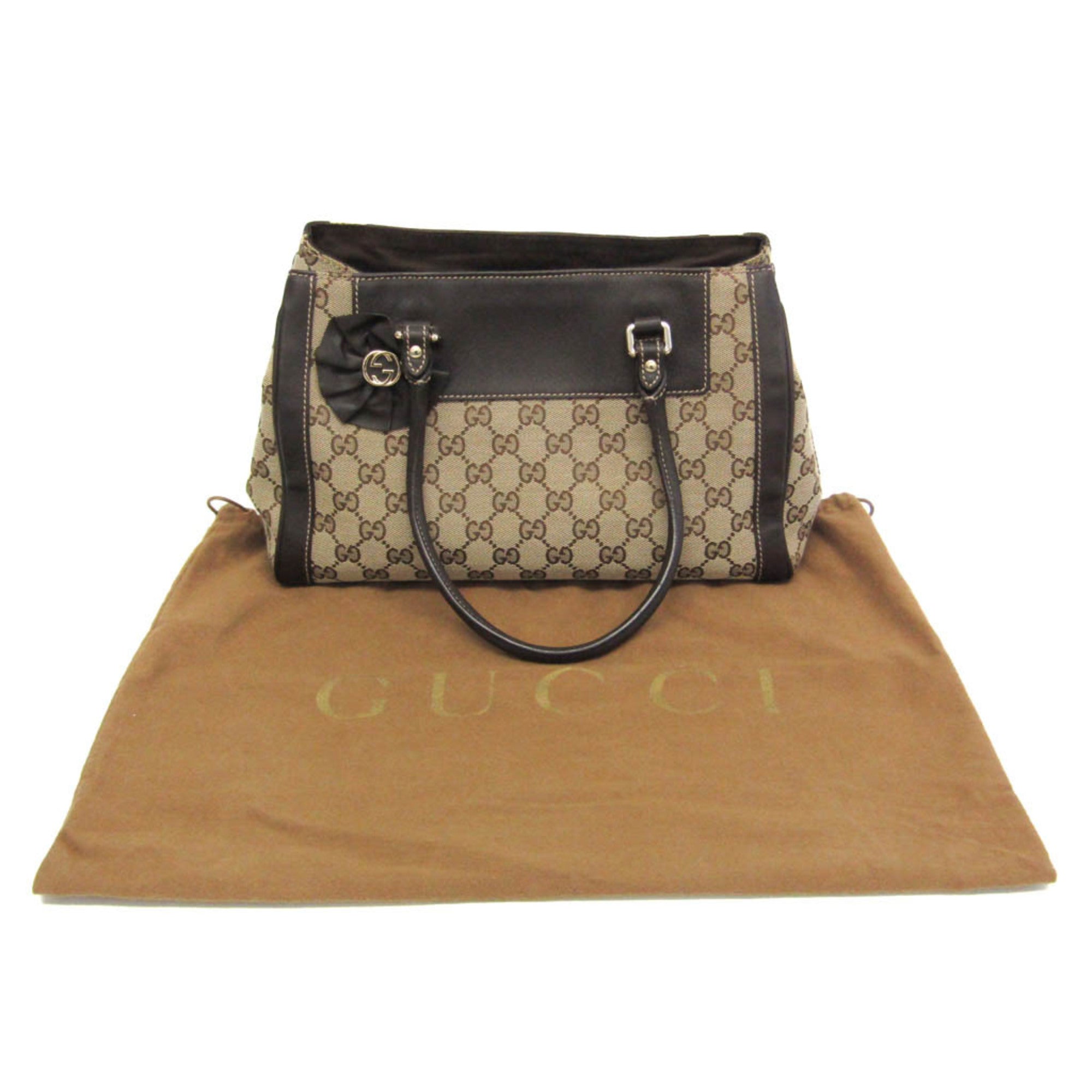 Gucci GG Canvas · Leather Handbag