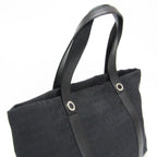 Bvlgari Logomania · Canvas & Leather