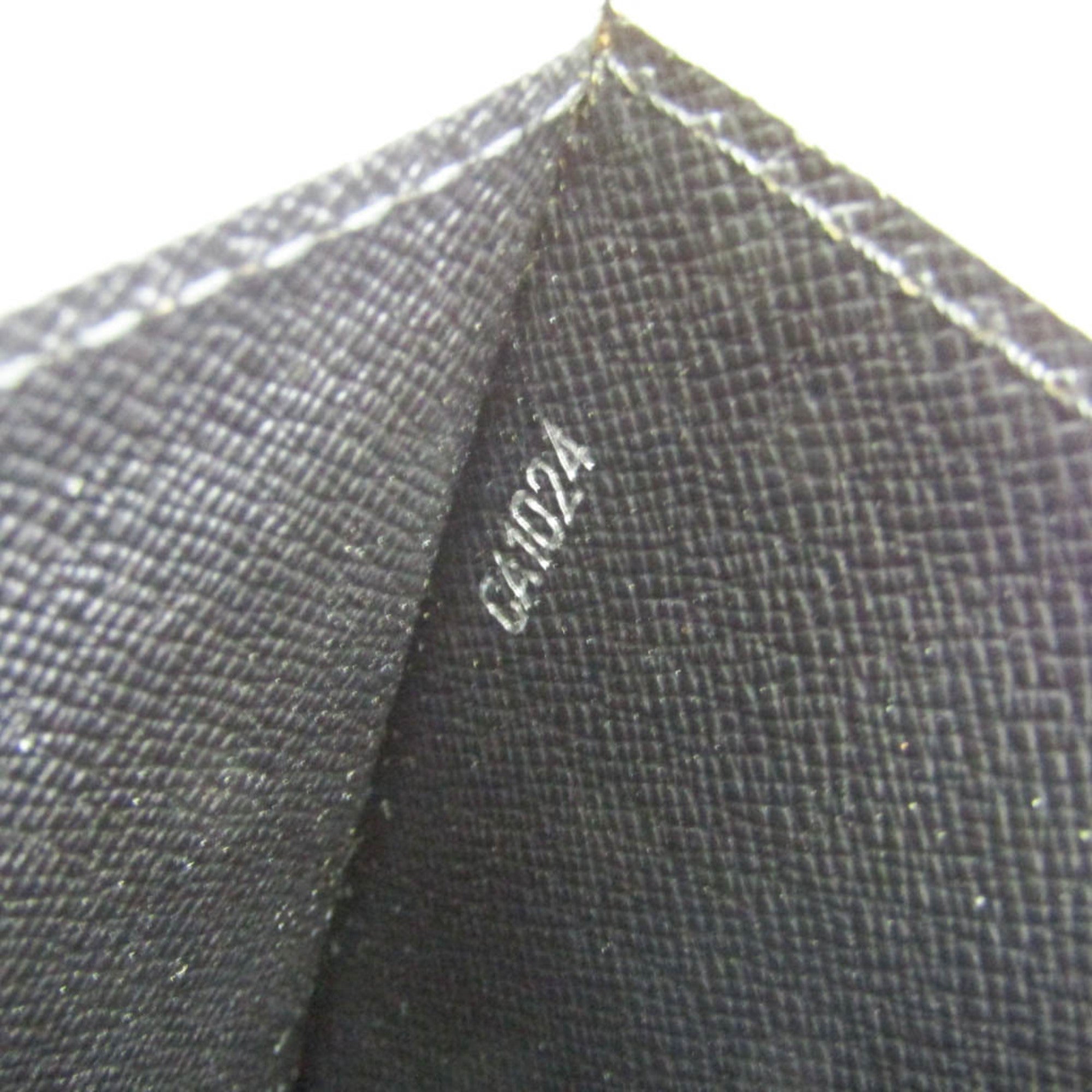 Louis Vuitton Taiga Selenga · Clutch