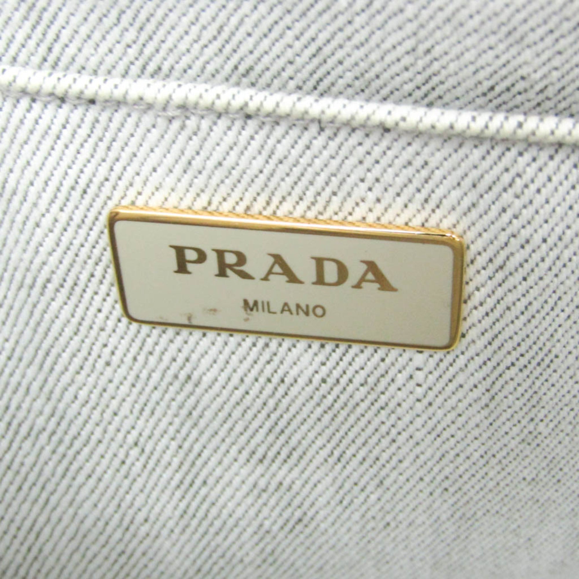 Prada Canapa · Denim · Flower Corsage