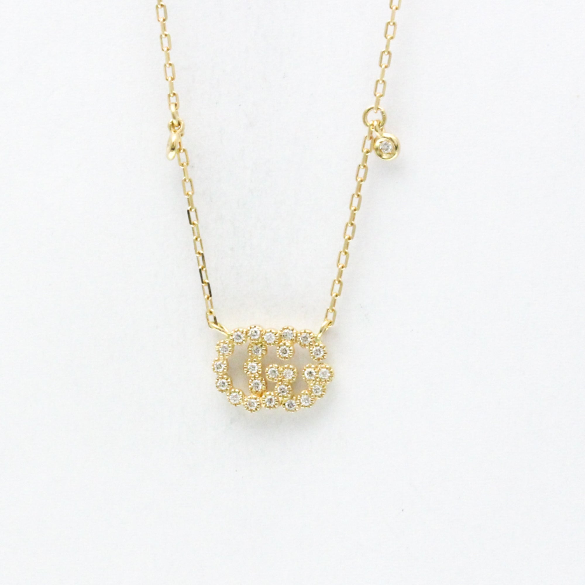 Gucci GG Logo · Diamond · 18K Yellow Gold