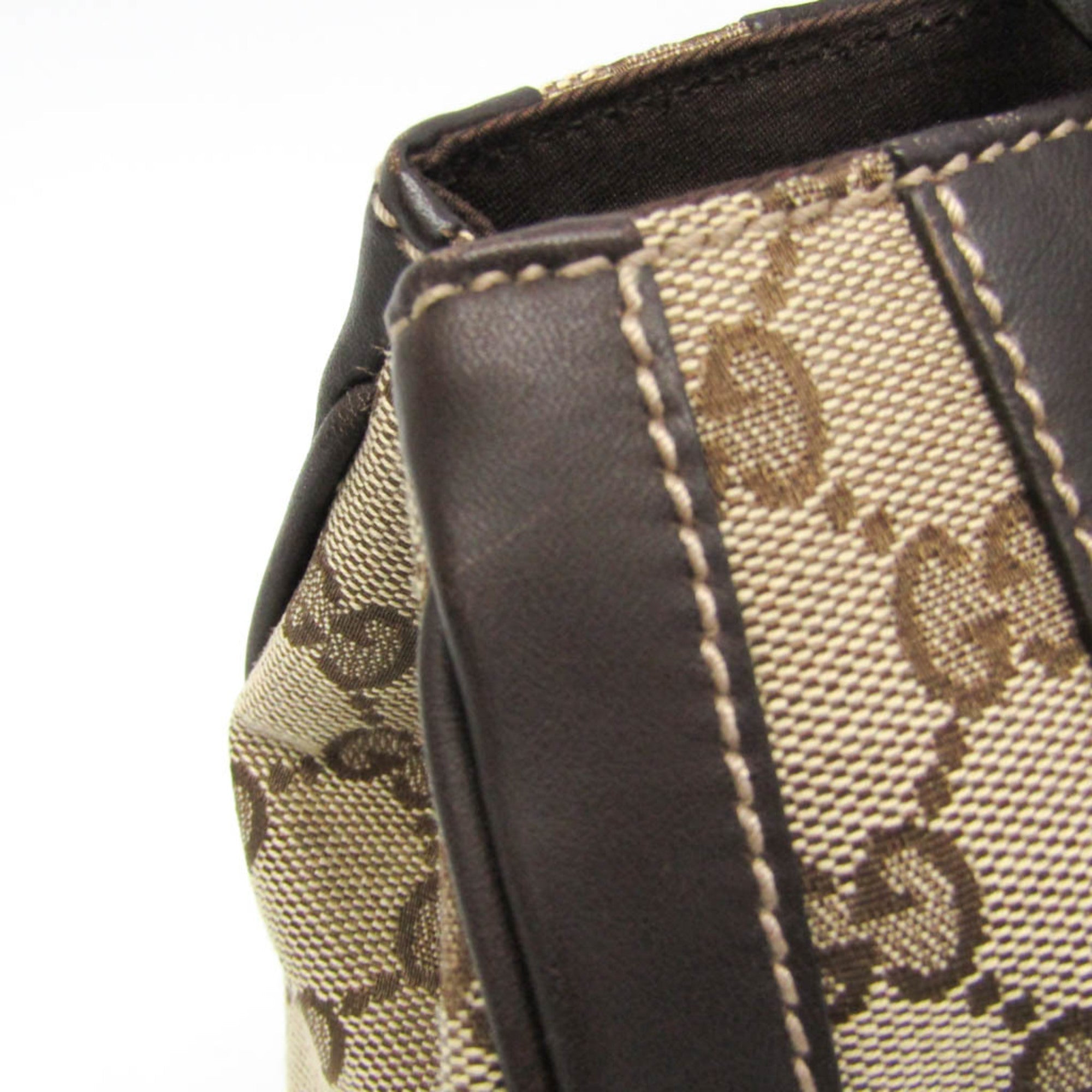 Gucci GG Canvas · Leather Handbag