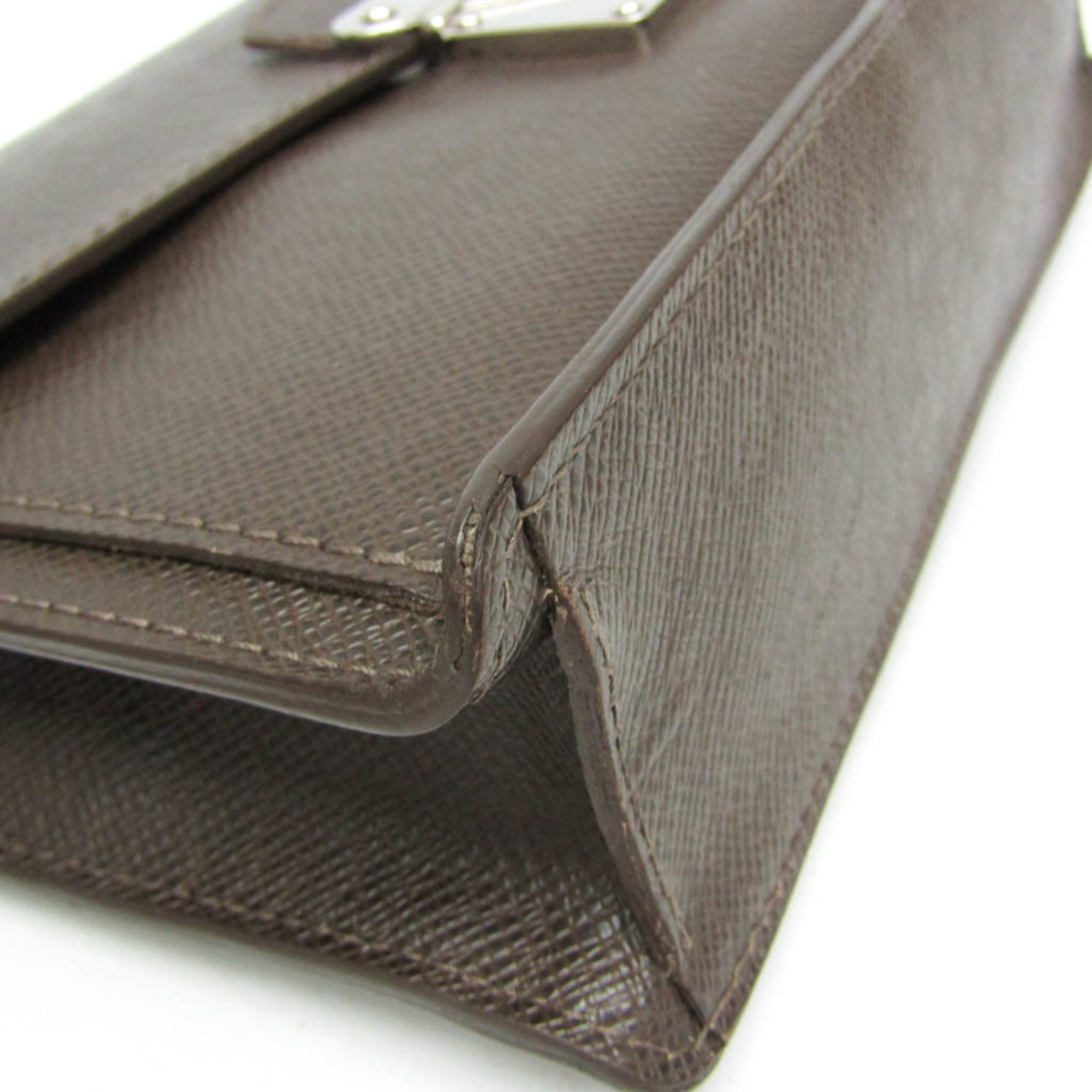 Louis Vuitton Veraia · Taiga Leather