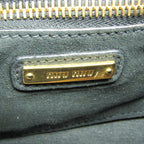 Miu Miu Madras · Leather