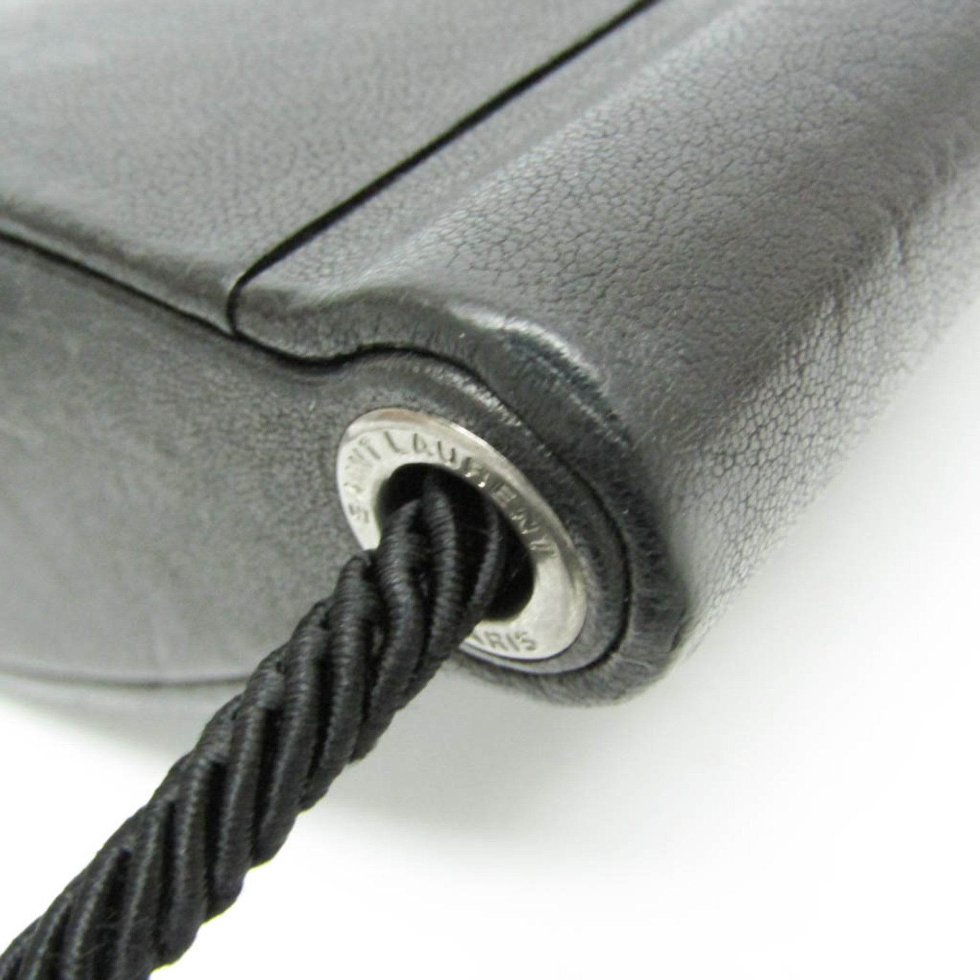 Yves Saint Laurent Opium · Leather