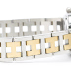 Hermès Clipper Oval · Steel & Gold