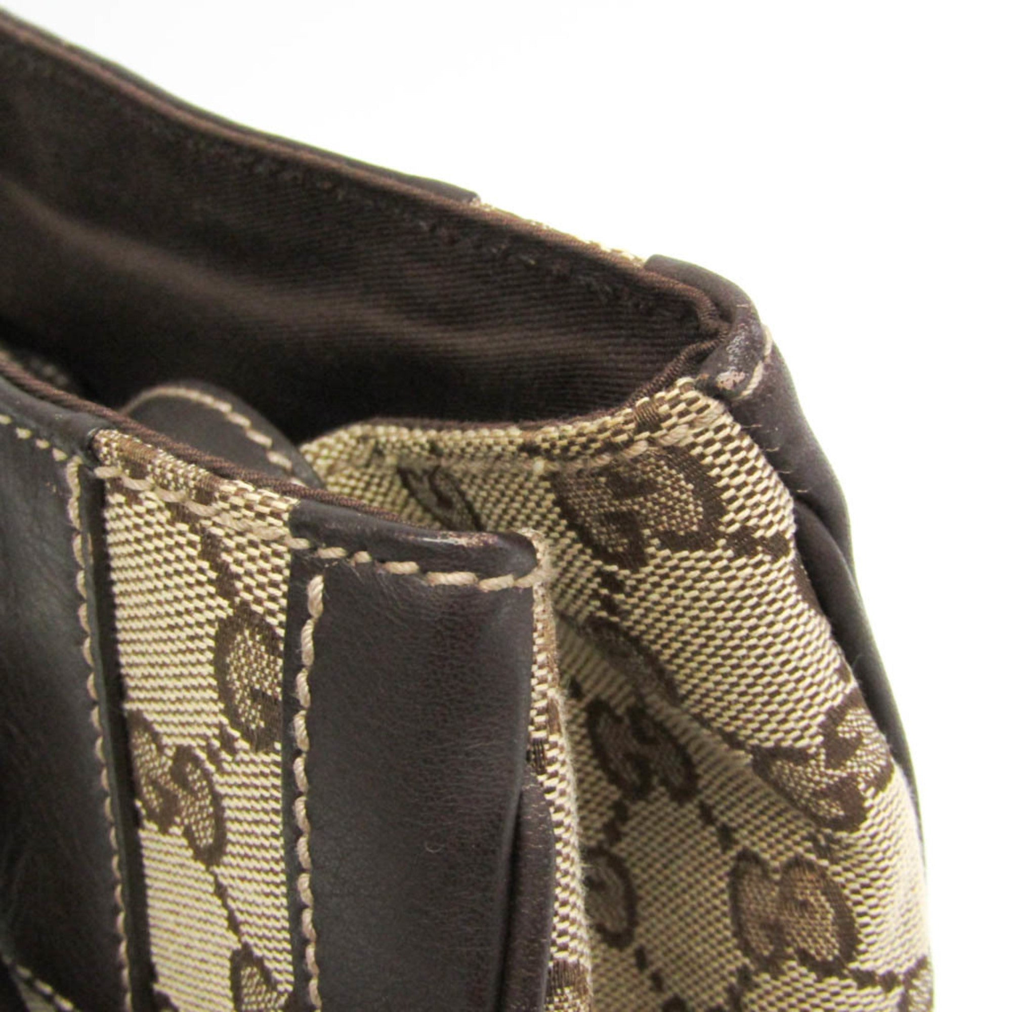 Gucci GG Canvas · Leather Handbag