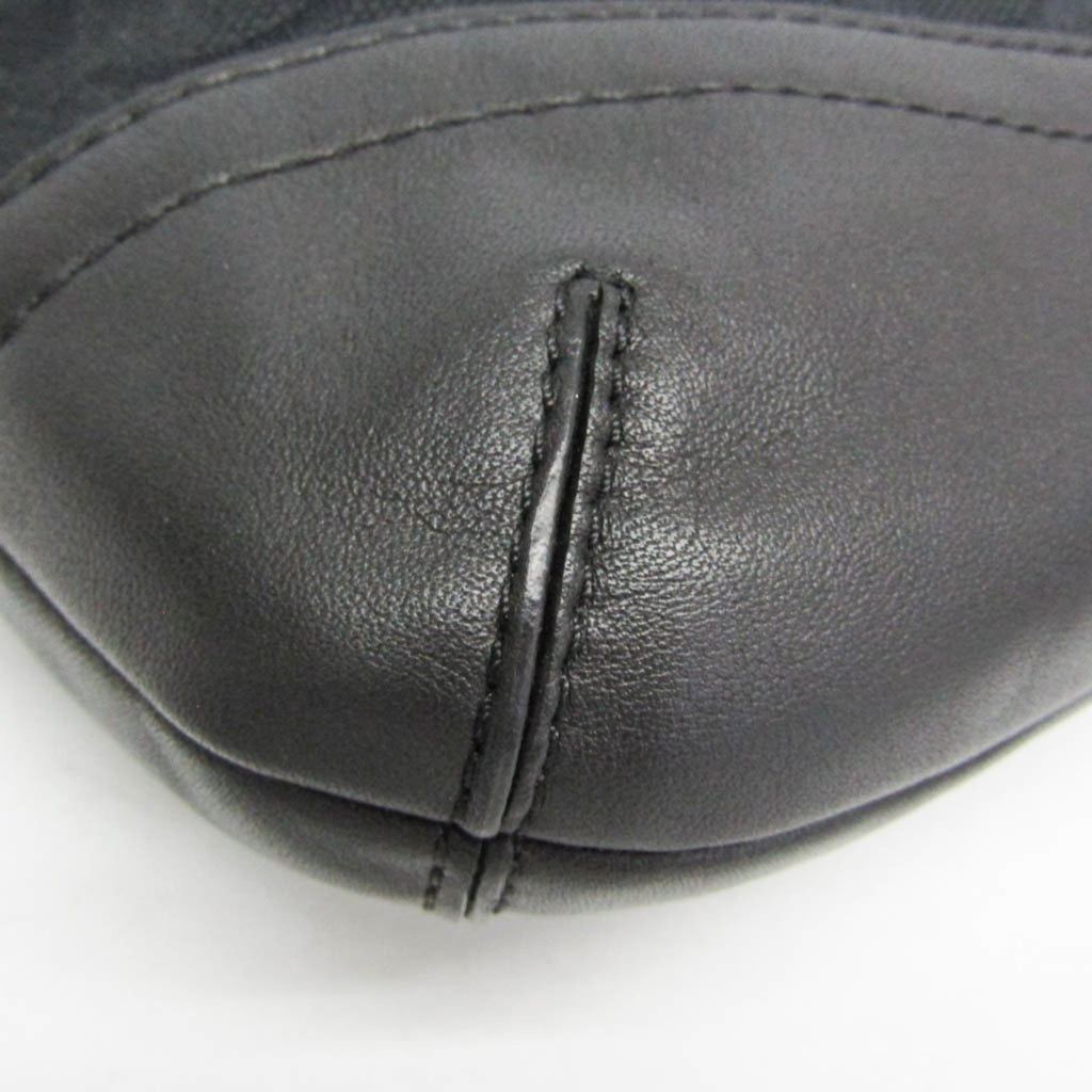 Coach Signature · Canvas & Leather