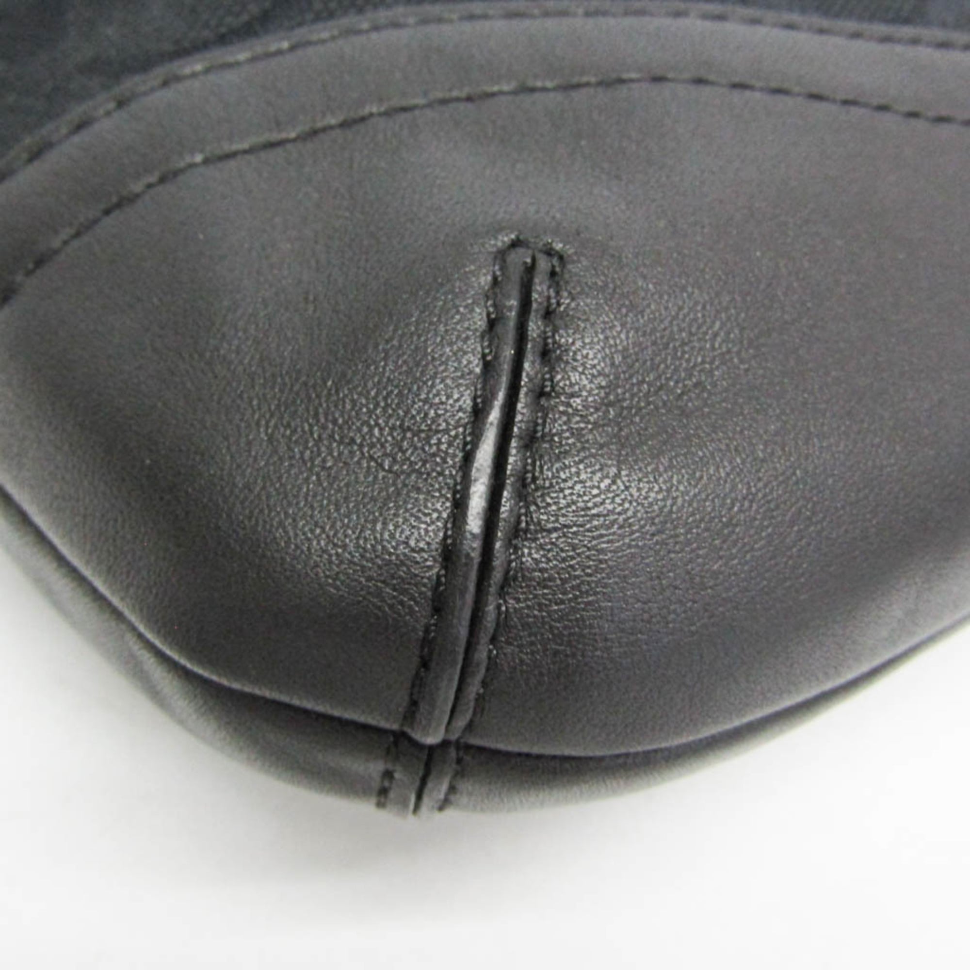 Coach Signature · Canvas & Leather