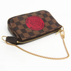 Louis Vuitton Damier Mini Pochette · Ebene