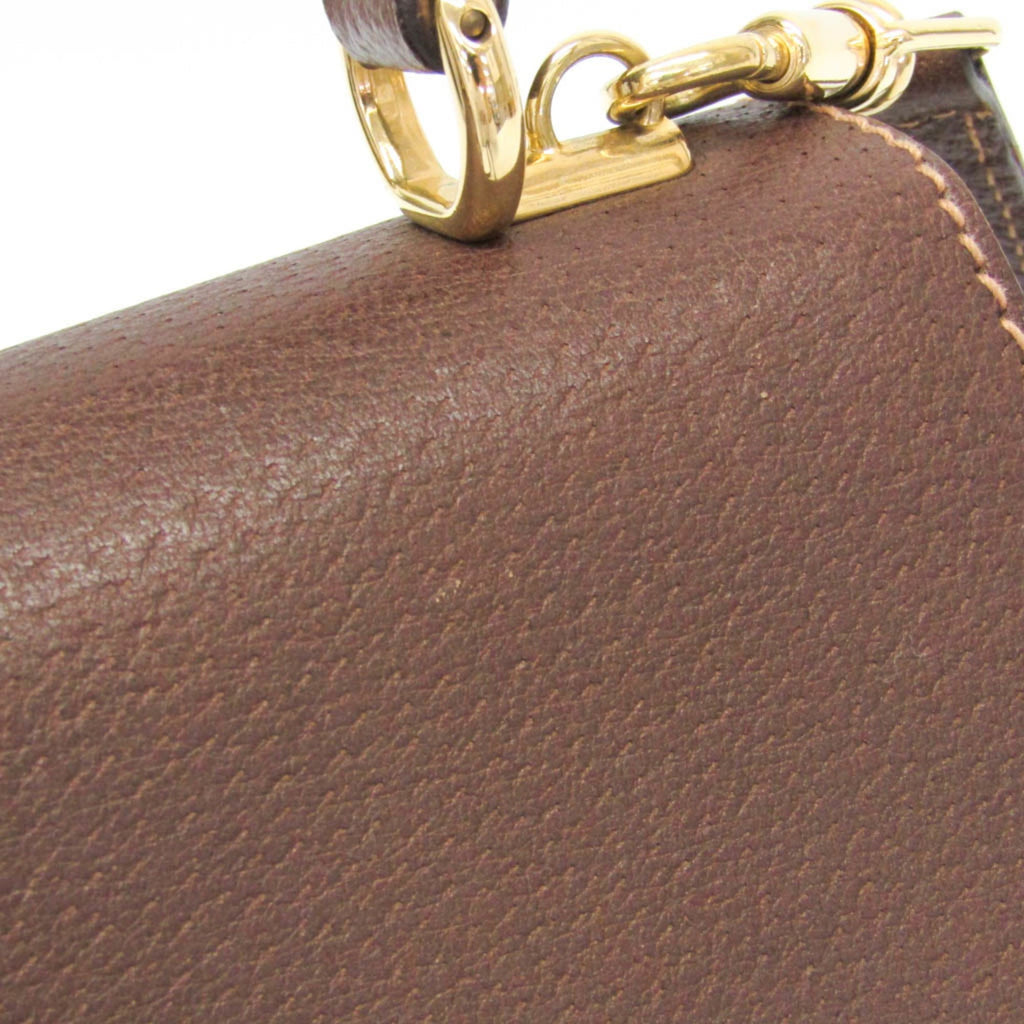 Gucci Lady Rock · Leather