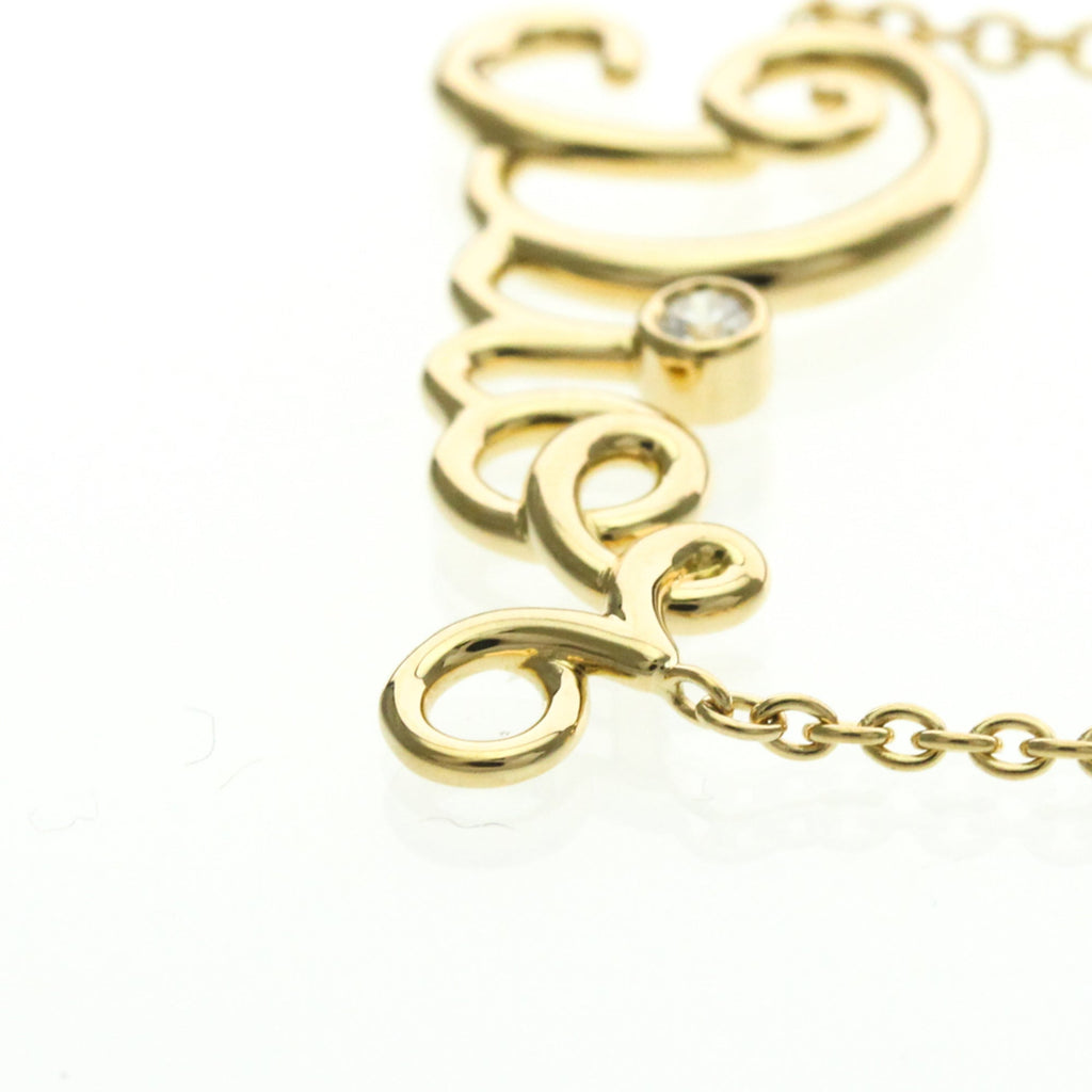 Christian Dior Dioramour · 18K Yellow Gold