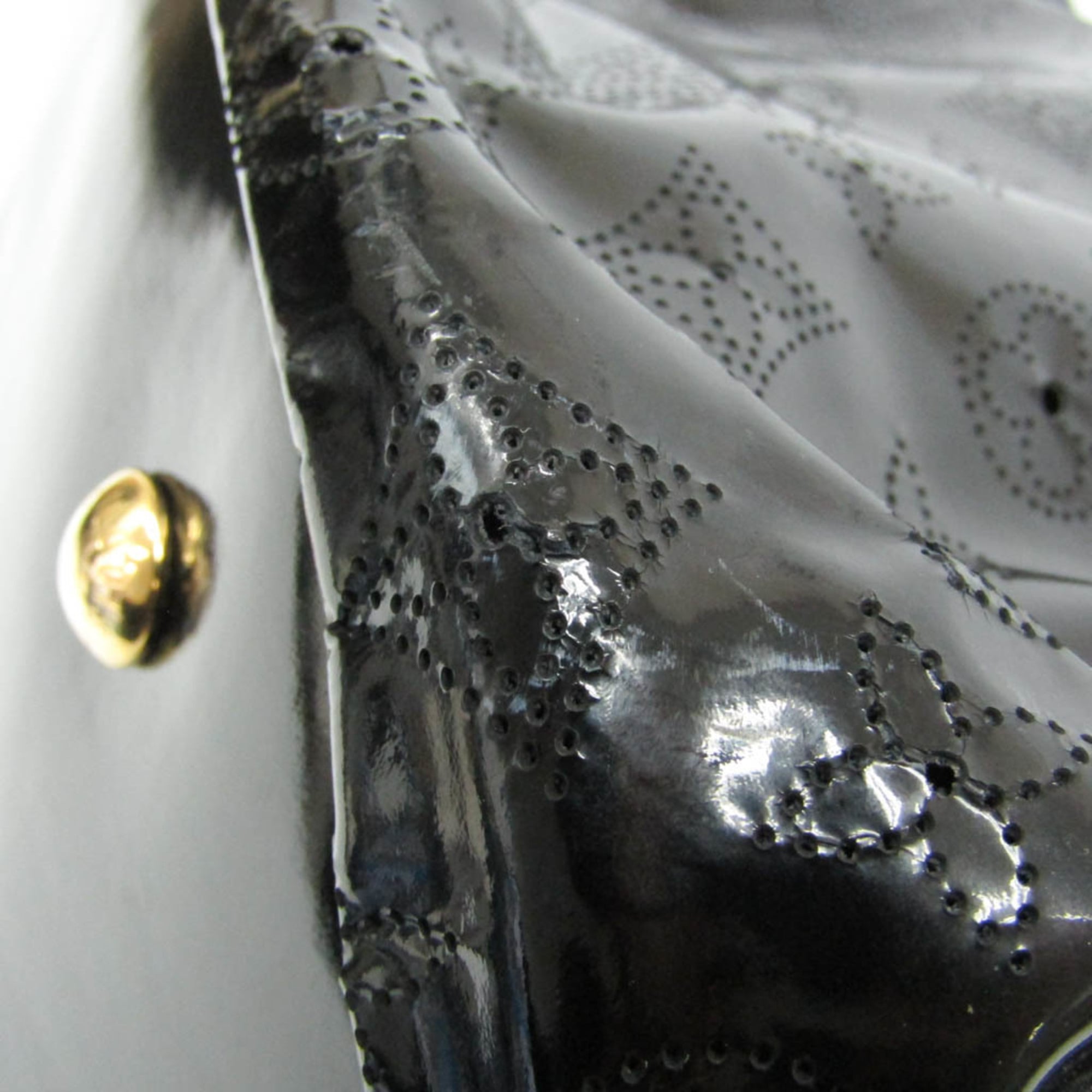 Louis Vuitton Mahina Souriya XL · Patent