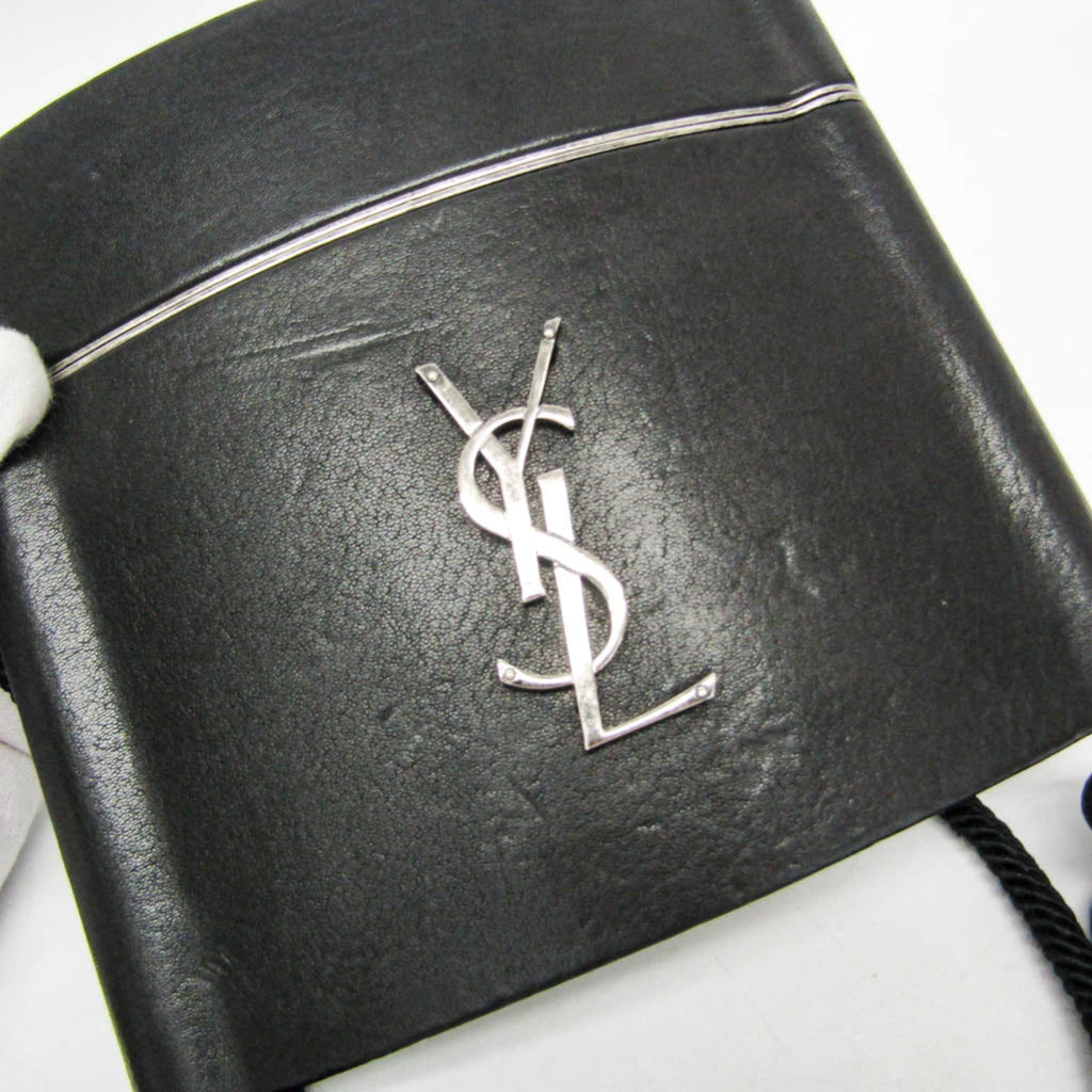 Yves Saint Laurent Opium · Leather