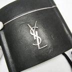 Yves Saint Laurent Opium · Leather