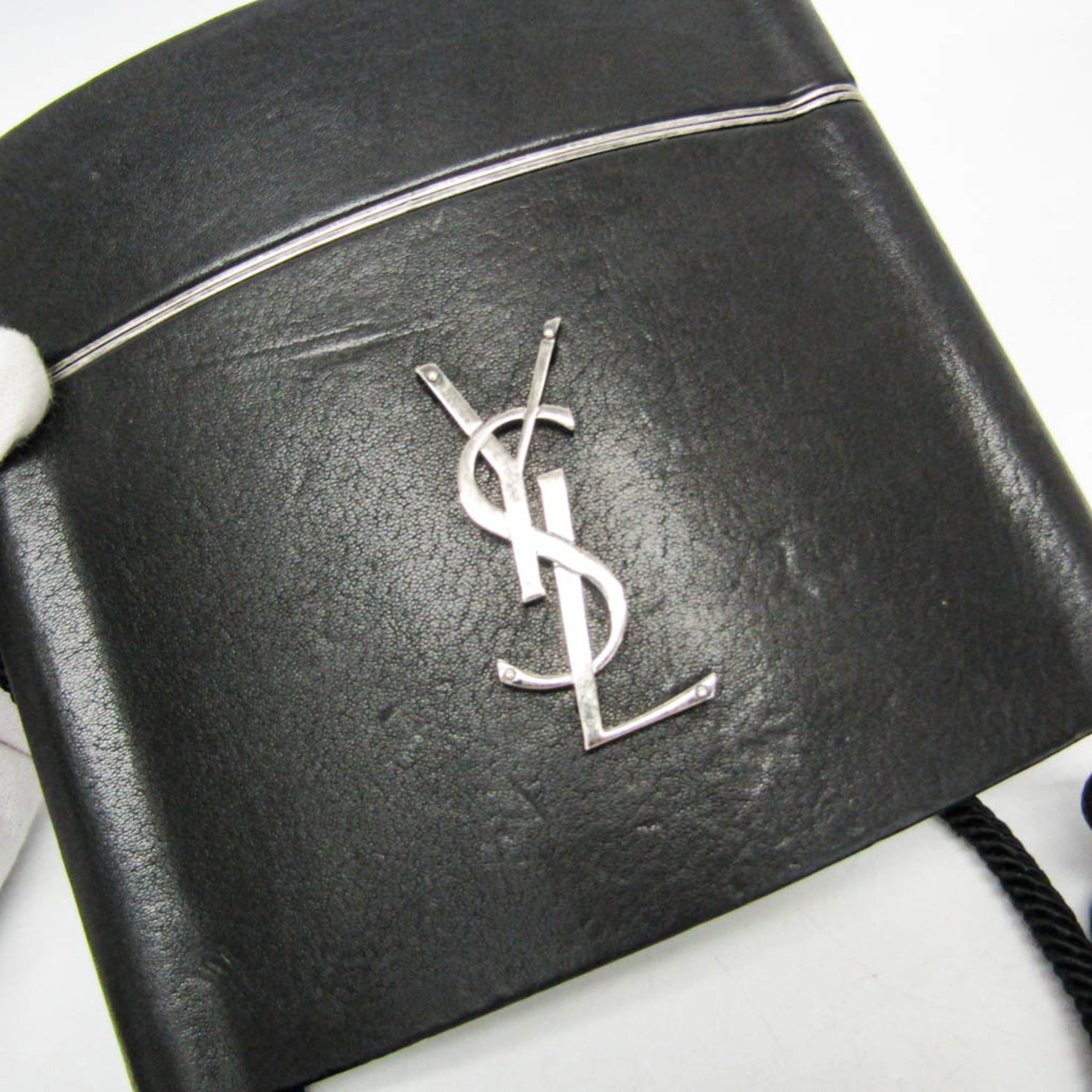 Yves Saint Laurent Opium · Leather
