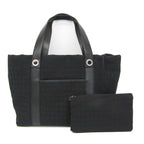 Bvlgari Logomania · Canvas & Leather