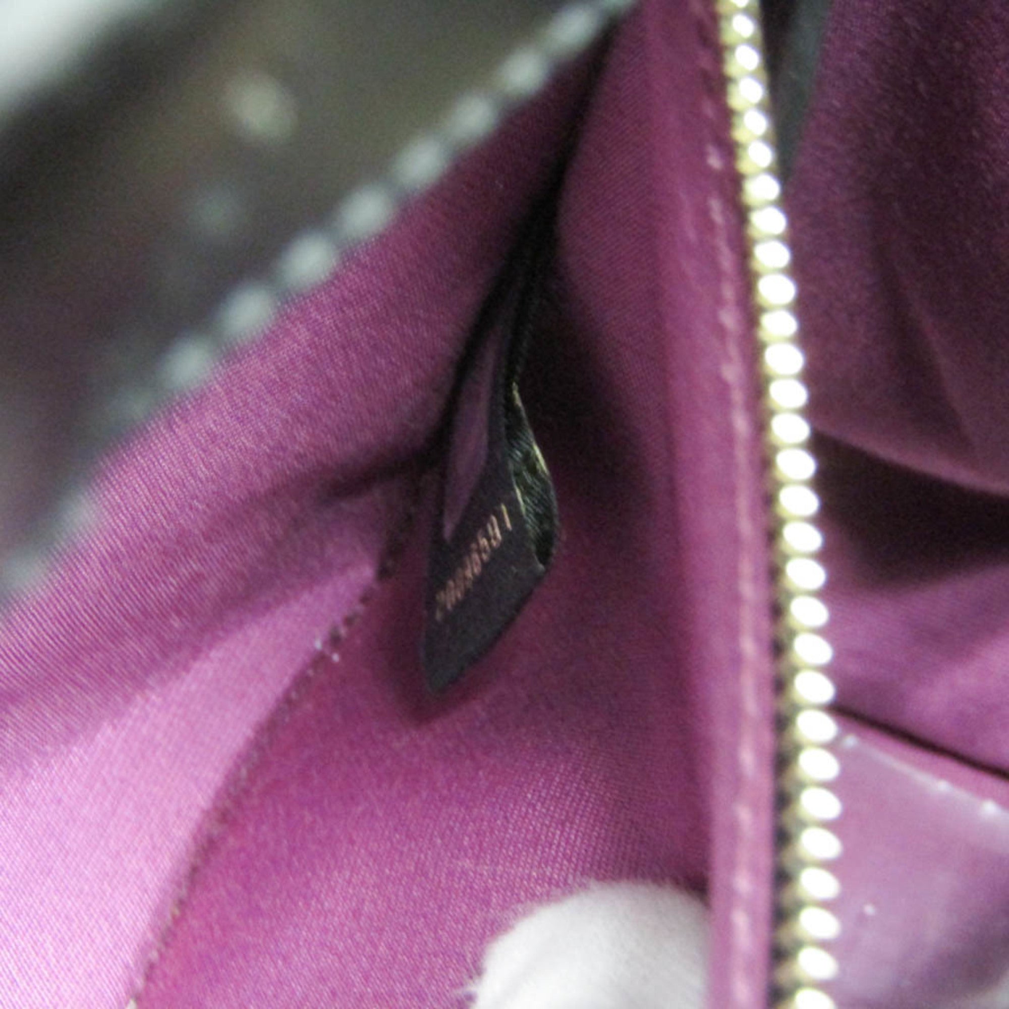 Bvlgari Monete · Leather