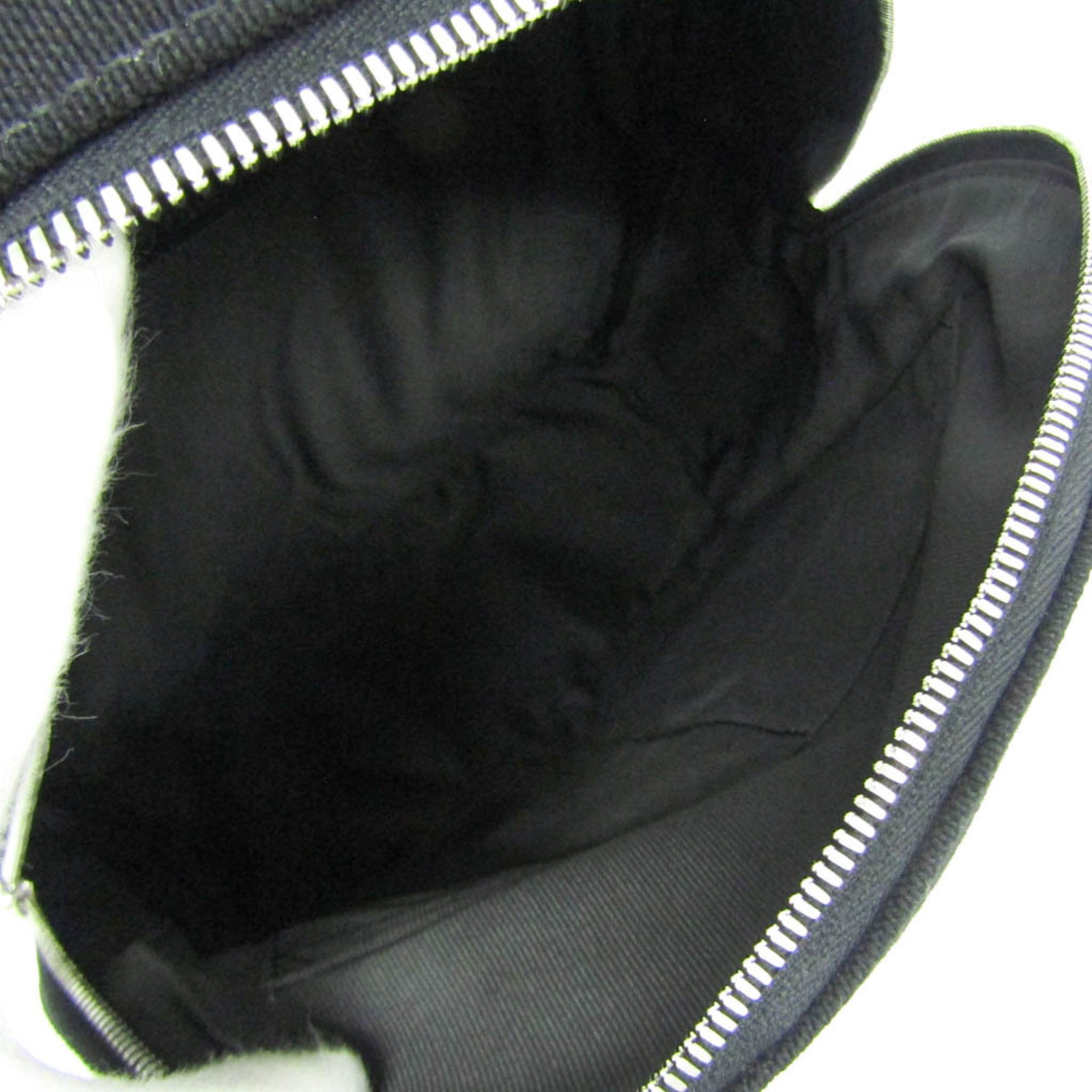 Coach · Leather & Canvas Backpack