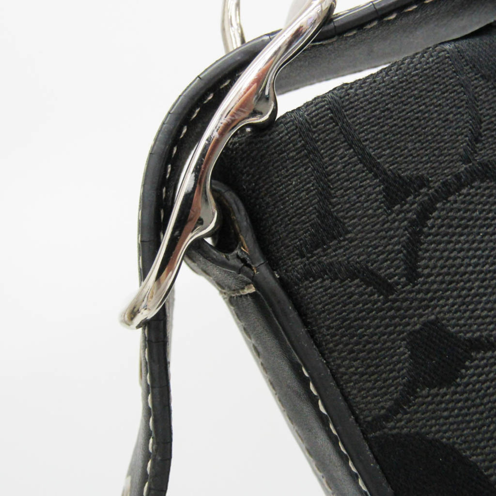 Coach Signature · Canvas & Leather