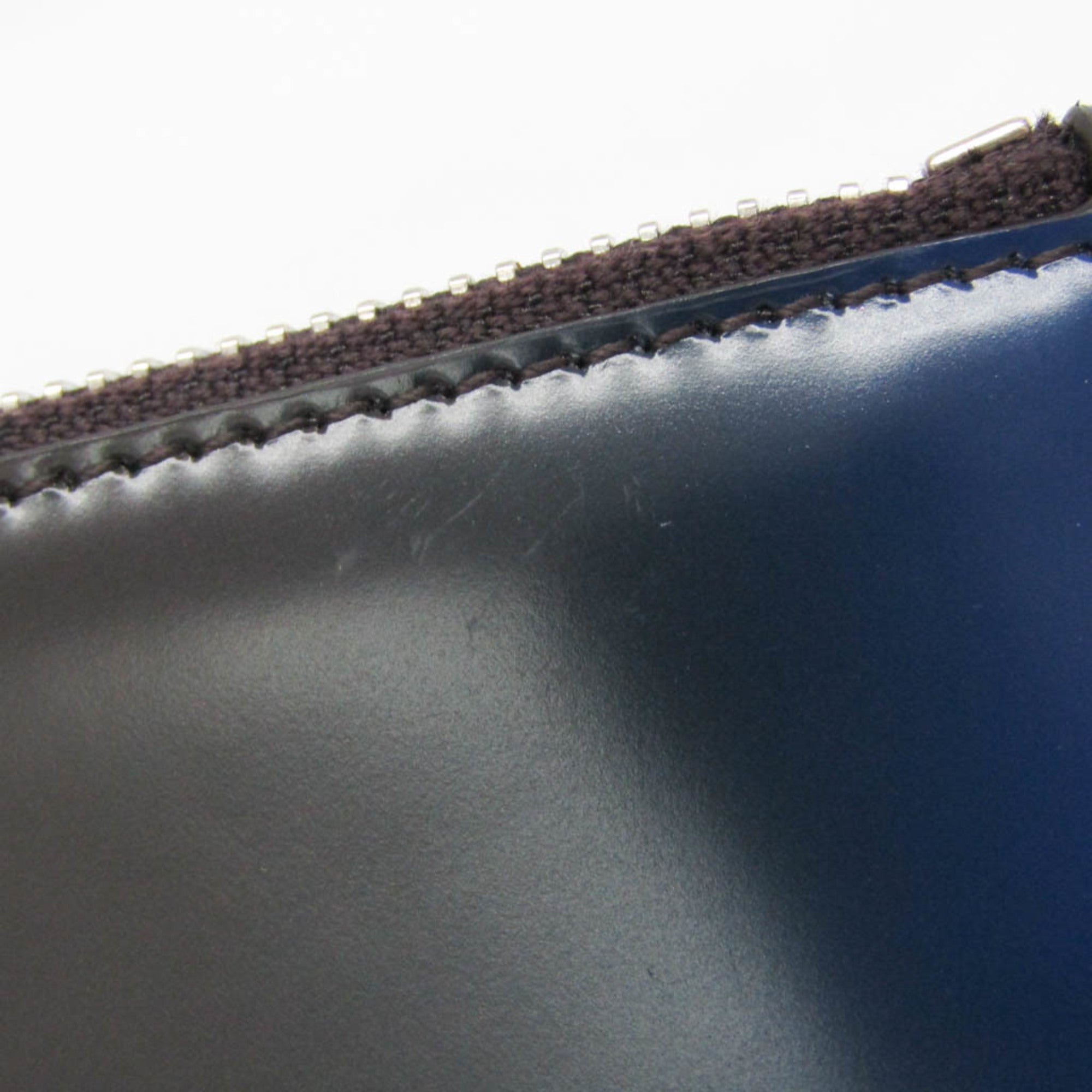 Salvatore Ferragamo · Leather Clutch