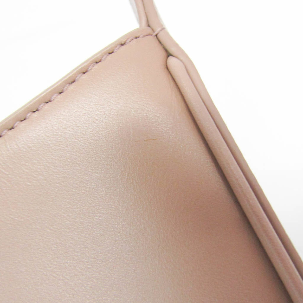 Yves Saint Laurent Le 5 À 7 · Leather