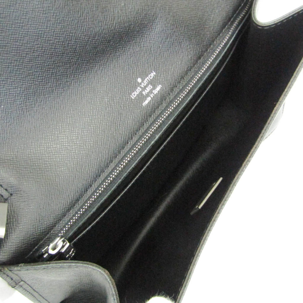 Louis Vuitton Taiga Selenga · Clutch