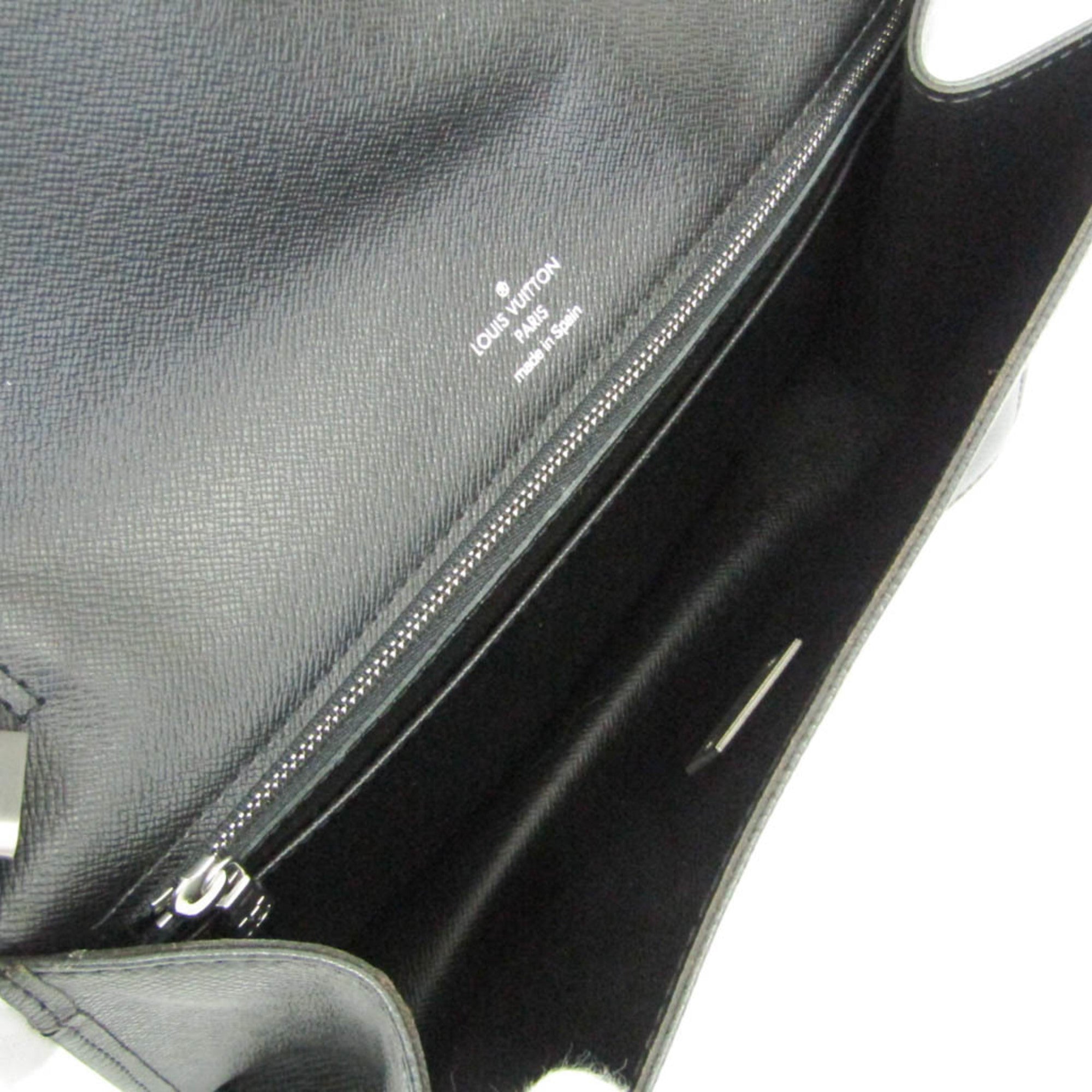 Louis Vuitton Taiga Selenga · Clutch