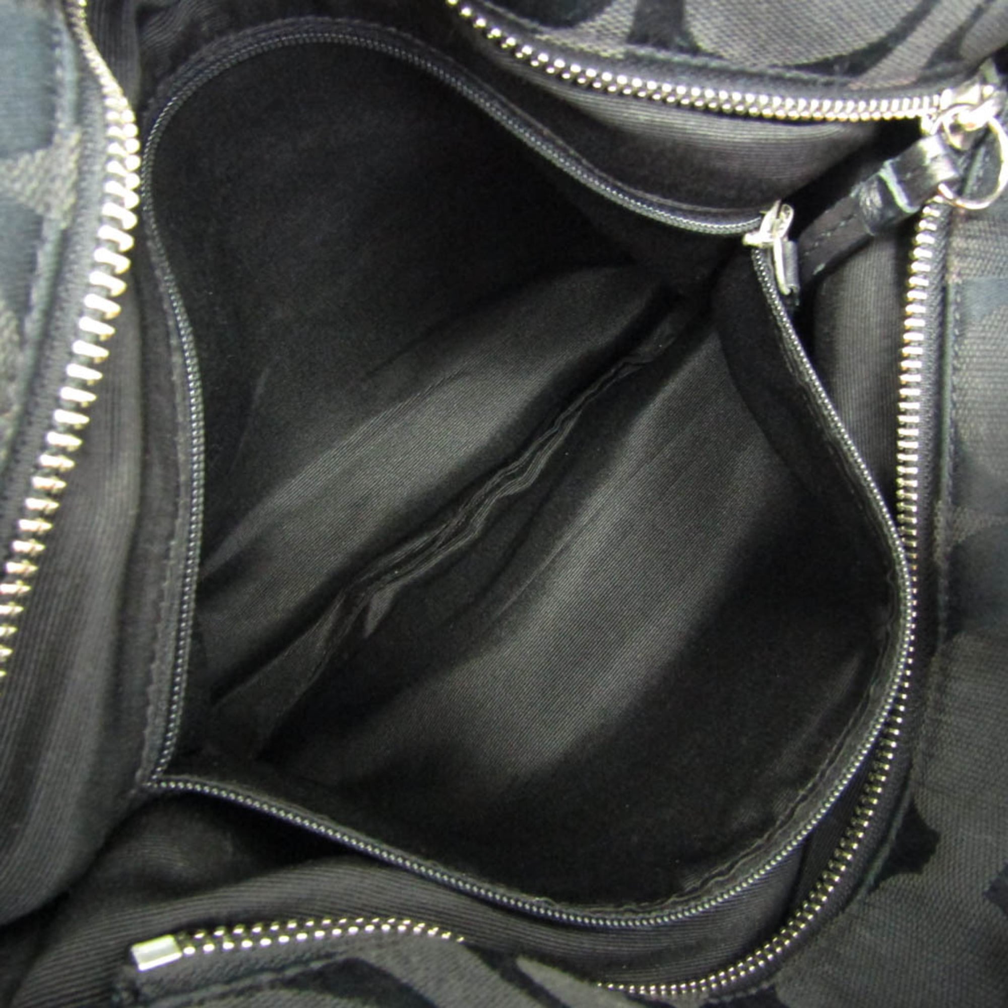 Coach Signature · Canvas & Leather
