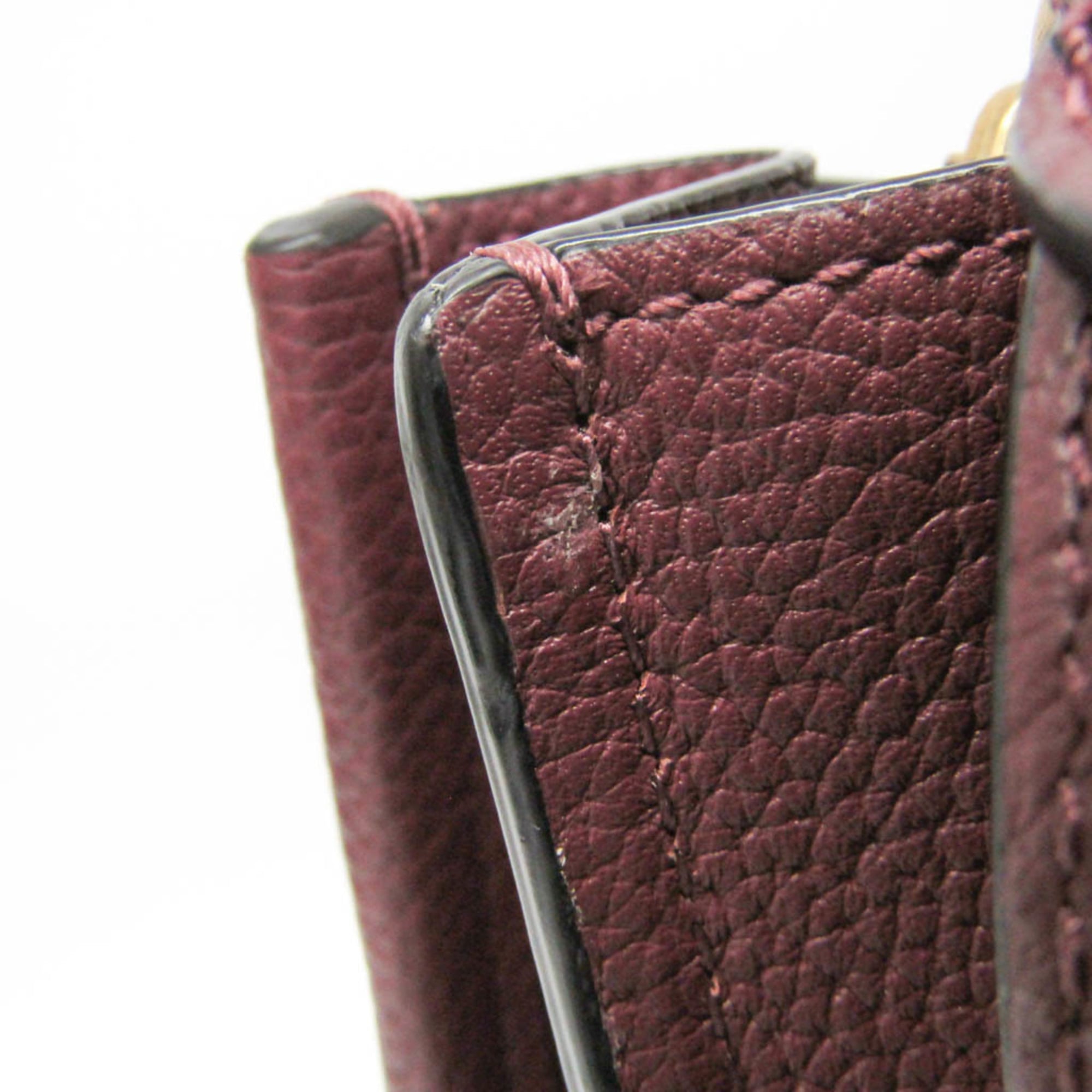 Coach Tyler Carryall · Leather