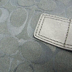 Coach Signature · Canvas & Leather