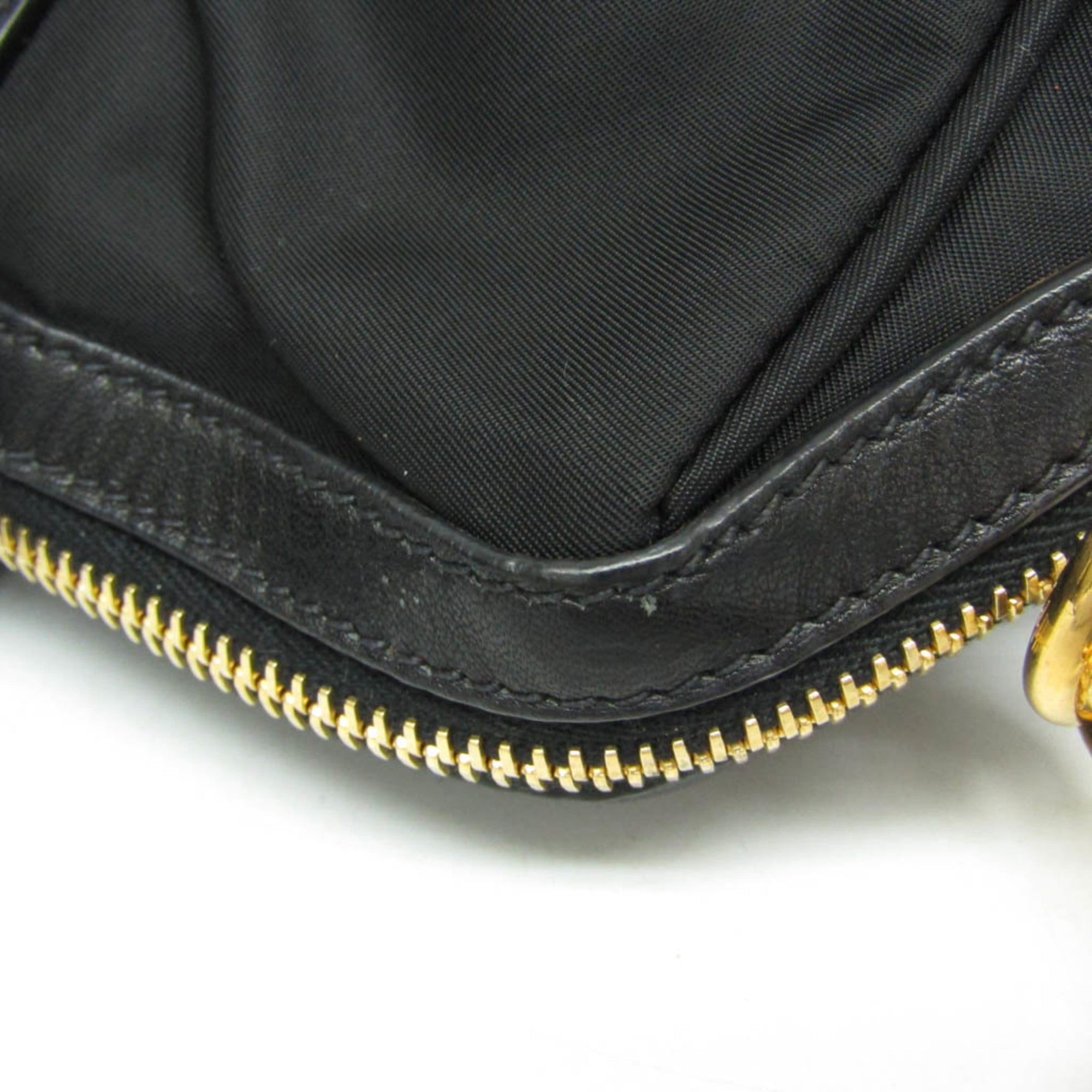 Prada Tessuto · Nylon & Leather