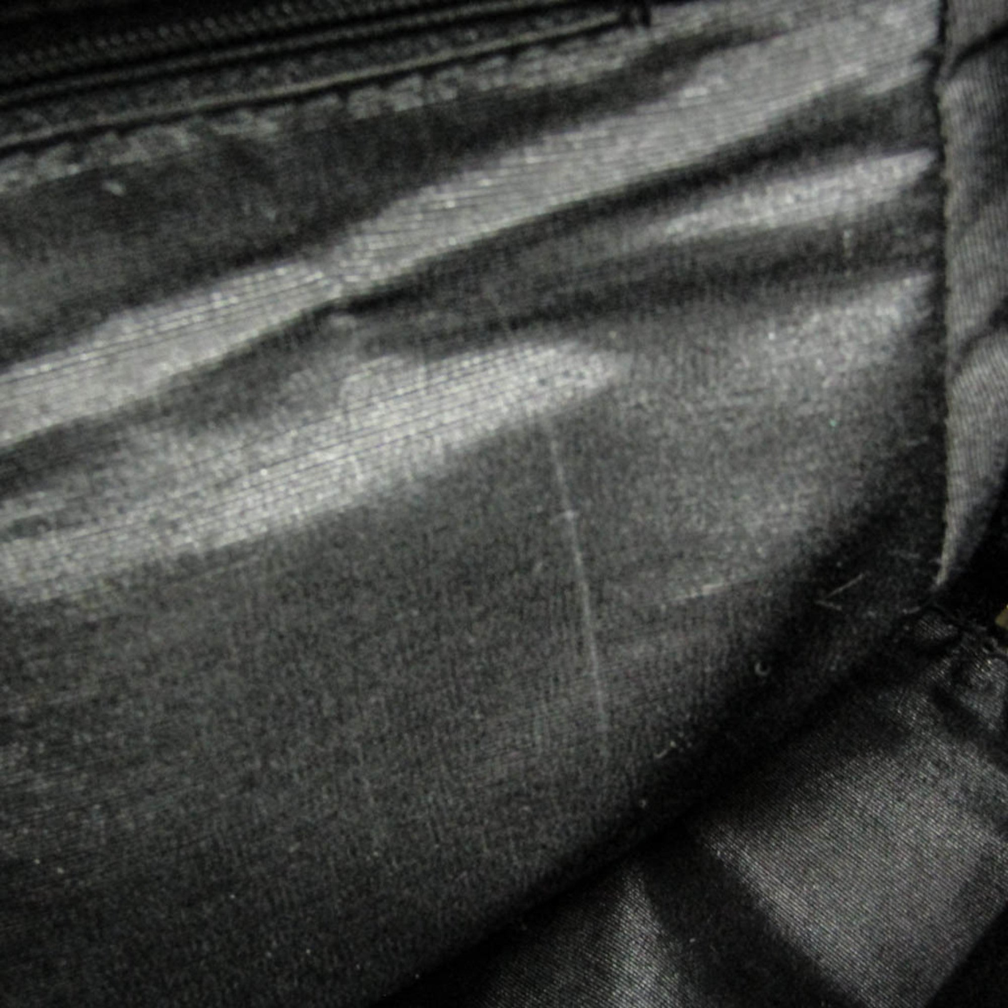 Bvlgari Logomania · Canvas & Leather