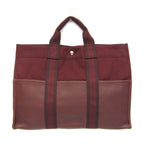 Hermès Fourre Tout MM · Canvas & Leather