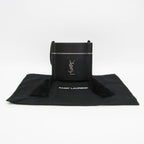 Yves Saint Laurent Opium · Leather